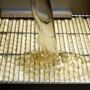 Making jewel-shaped chocolates in a factory