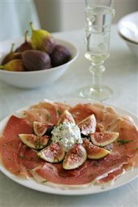 Figs with minted yoghurt on Parma ham