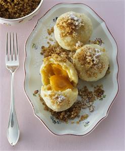 Apricot dumplings with buttered breadcrumbs