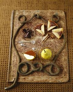 Still life: pieces of tarte Bourladoue with chocolate, pear