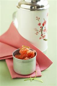 Watermelon granita with lime in a metal container