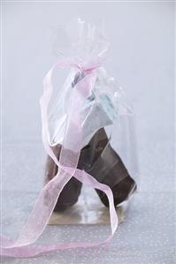 Two chocolate marshmallows, gift-wrapped