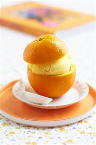 Orange ice cream in hollowed-out orange