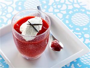 Berry puree with fresh goat's cheese in a glass