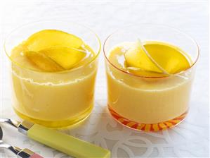 Mango lassi made with kefir in two glasses