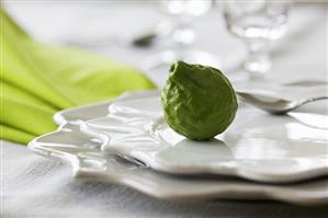 A kaffir lime on plates