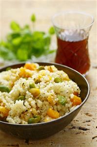 Couscous with apricots, pistachios, almonds, onions, mint