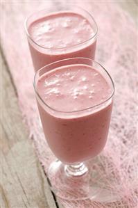 Cherry yoghurt drink in two glasses