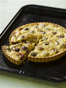 A ricotta tart on a baking tray