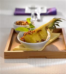 Roasted pineapple with sweet and spicy almond sauce