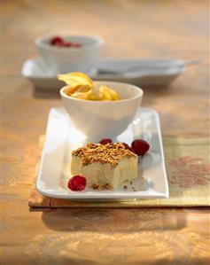 Star-shaped coconut-cinnamon ice cream with nuts, raspberries, physalis