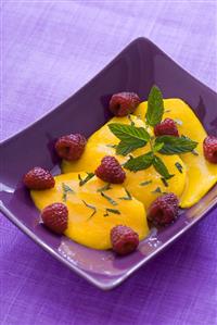 Marinated mango with raspberries and mint