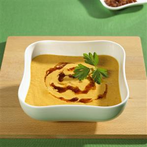 Carrot and orange soup with tomato pesto