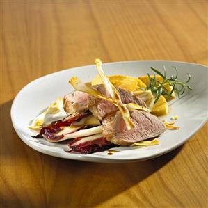 Roast pork fillet on Treviso radicchio, caramelised quinces