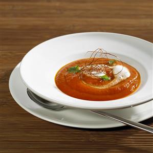 Tomato and papaya soup with vanilla milk foam