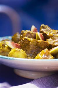 Braised lamb with saffron and figs on couscous