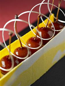 Glazed cherries in pastry case