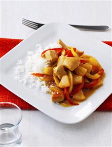 Sweet and sour chicken with peppers, pineapple and rice