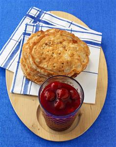 Cream cheese pancakes with cherry compote