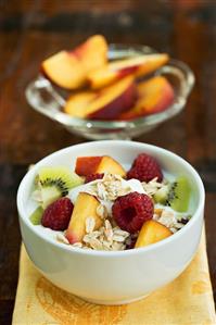 Yoghurt with muesli and fresh fruit