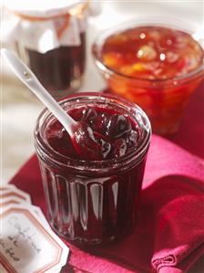 Cherry and sour cherry jam in jars