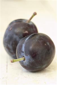 Two purple plums