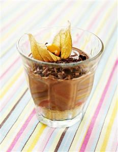 Mousse au chocolat with grated chocolate & physalis in glass