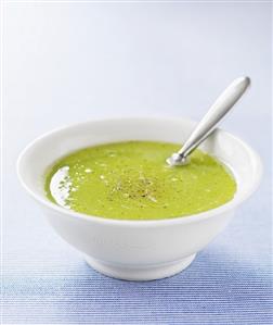 Cream of broccoli soup with spoon