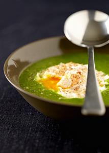 Herb soup with poached egg