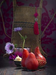 Red wine pears with ginger ice cream