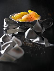 Citrus fruit salad with caraway seeds in a dish