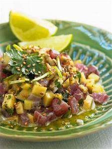 Tuna tartare with mango, coriander, coconut milk & sesame seeds