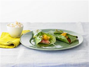 Red mullet with mango and aubergine compote in banana leaf