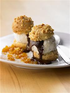 Profiteroles with vanilla ice cream, coconut, caramelised pineapple