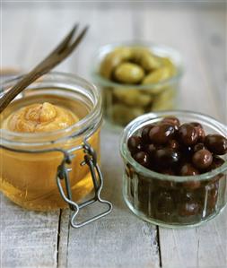 Pickled lemon and olives in preserving jars