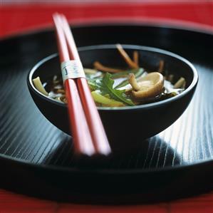 A bowl of Japanese vegetable soup with mushrooms