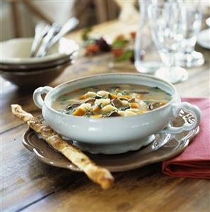 Potato soup with mushrooms and savoury stick