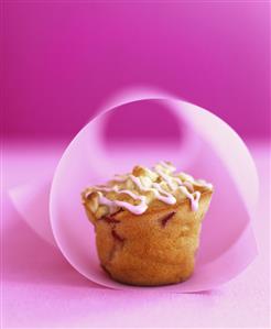 Plum muffin with nuts and icing