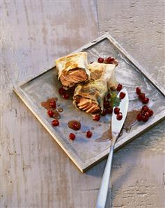 Salmon in filo pastry with pomegranate seeds