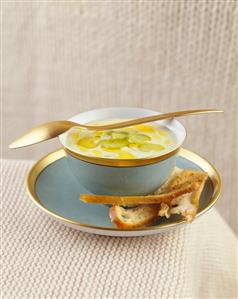 Cream of celery soup with olive oil and toast