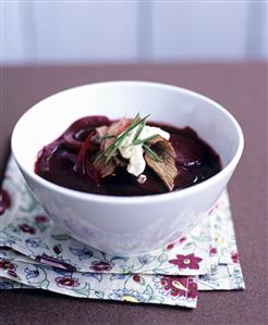 Beetroot soup with sirloin steak and horseradish cream