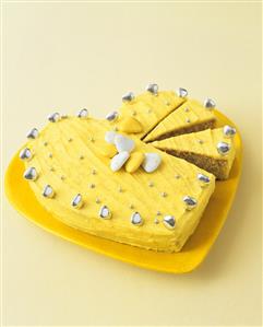 Yellow heart-shaped cake for Valentine's Day