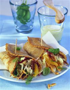 Pancake rolls filled with fennel and radicchio salad