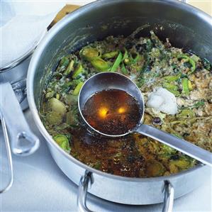 Making clear oxtail broth (skimming)