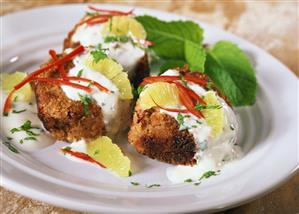 Bean burgers with yoghurt and lime sauce