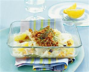 Fish gratin with breadcrumb crust and oranges