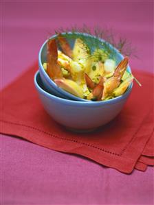 Salad of white peaches with tiger prawns and pistachios