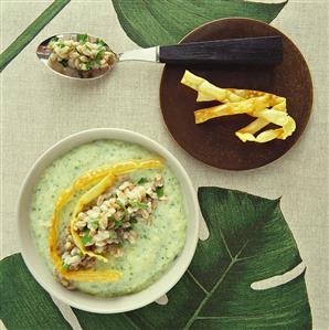 Courgette and barley soup with deep-fried noodles