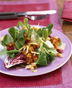 Winter salad with dried apricots and pesto