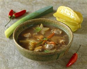 Vietnamese clam soup with carambola